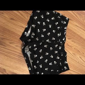 Black shorts with skulls. Junior size 7.
